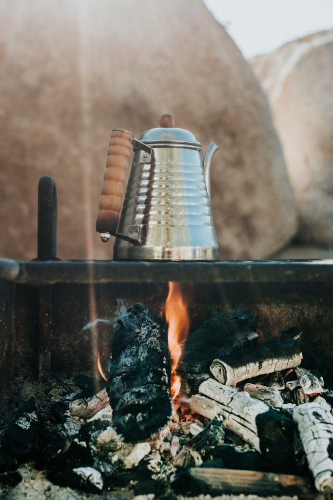 stainless steel kettle on fire